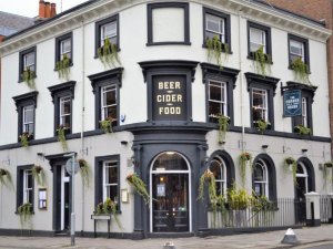 a close up of a street in front of a building