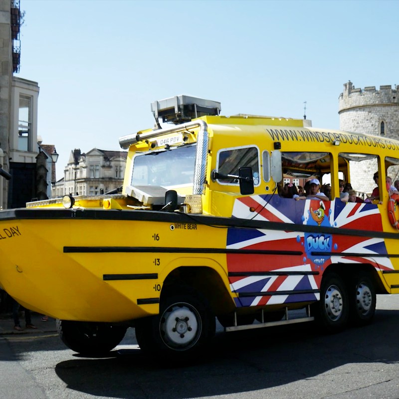 a truck is parked in front of a building