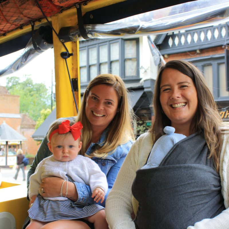 a woman sitting on a bus