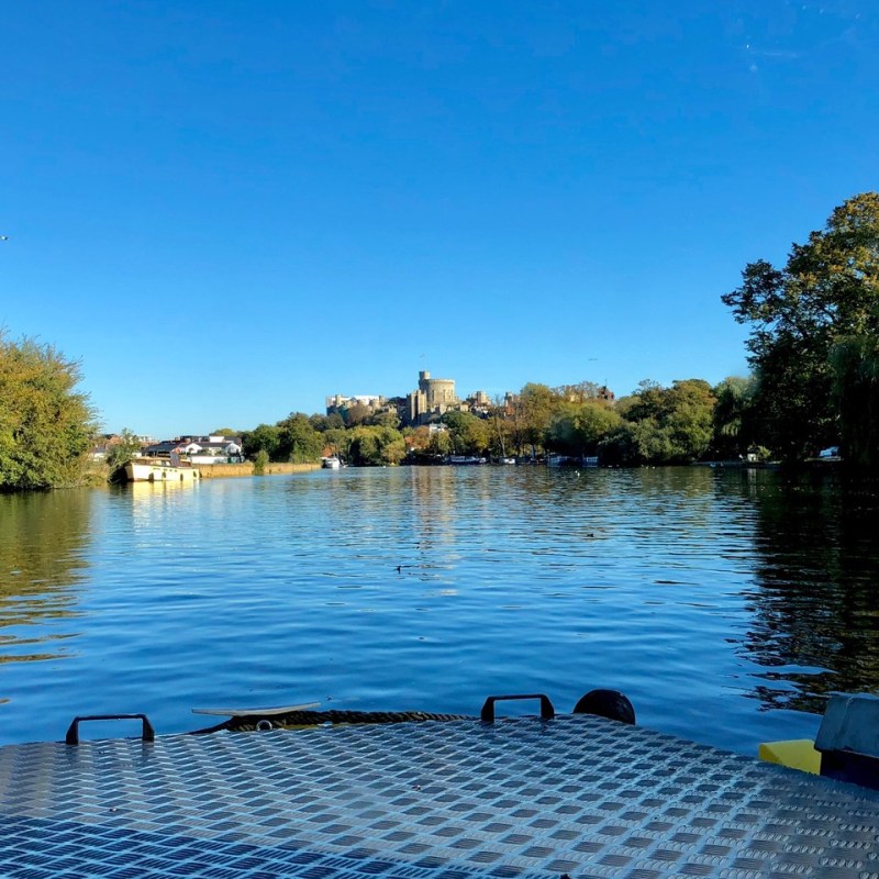a boat is docked next to a body of water