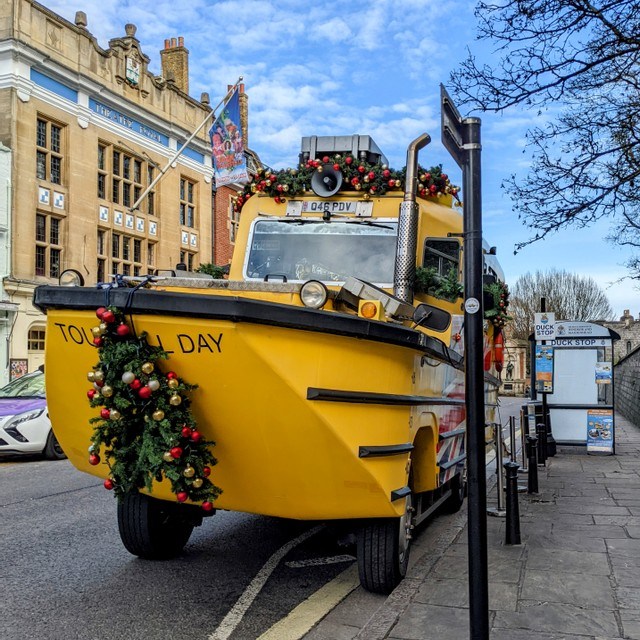 a boat parked on the side of a road