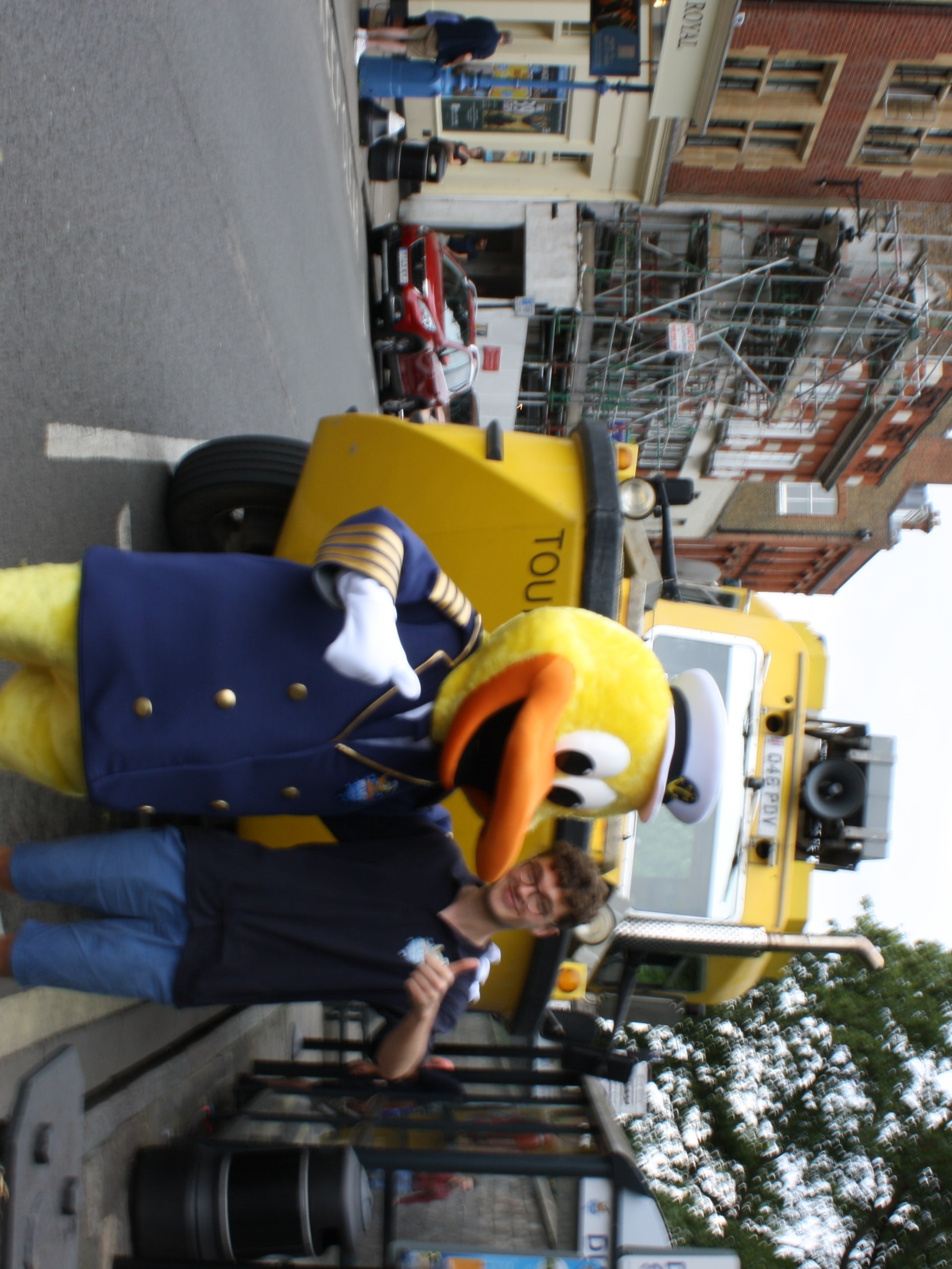 a couple of people that are standing in the street